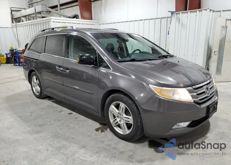 2012 Honda Odyssey Touring z USA, uszkodzony, nr VIN 5FNRL5H93CB053327